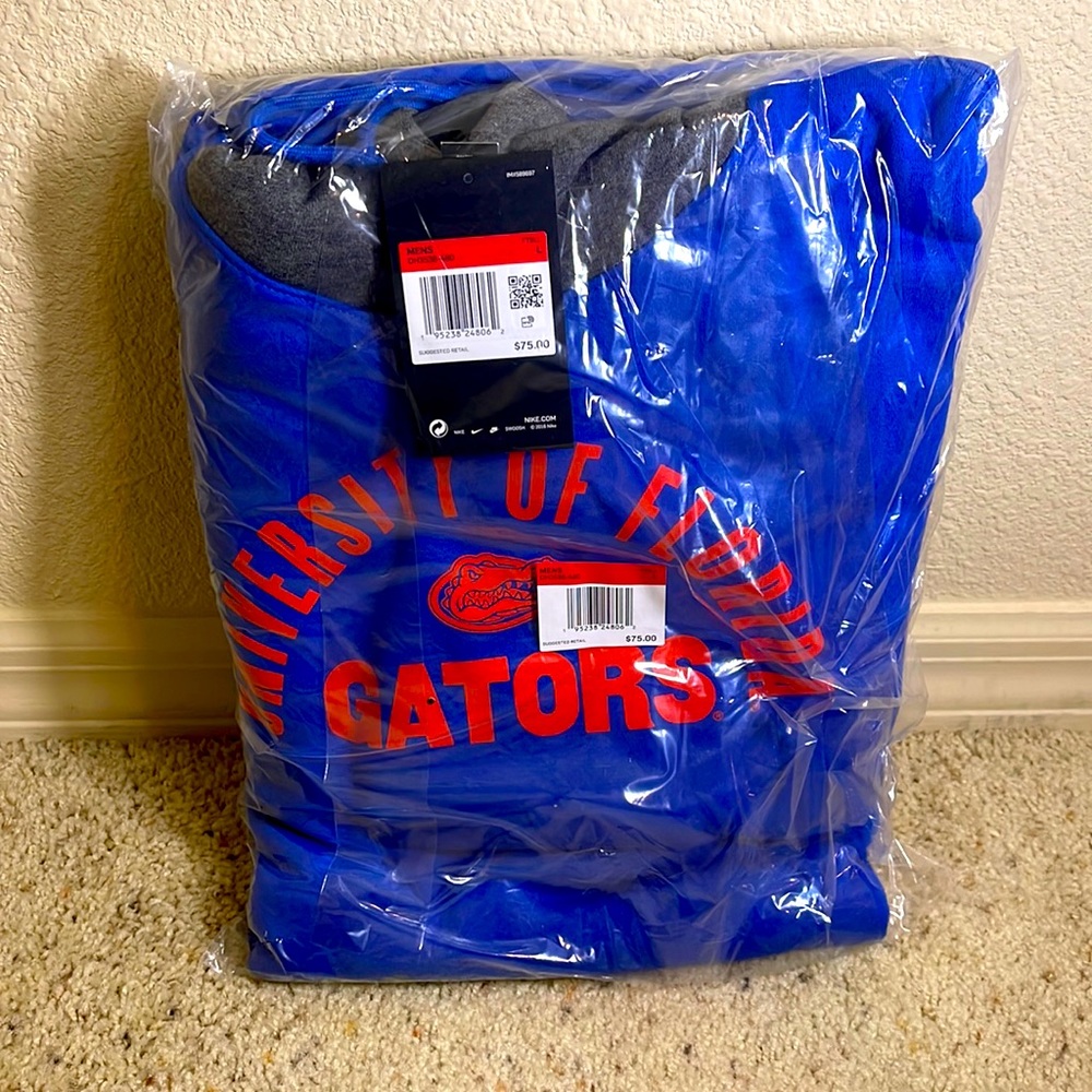 Size L Nike University of Florida hoodie pullover. NWT still in wrapping